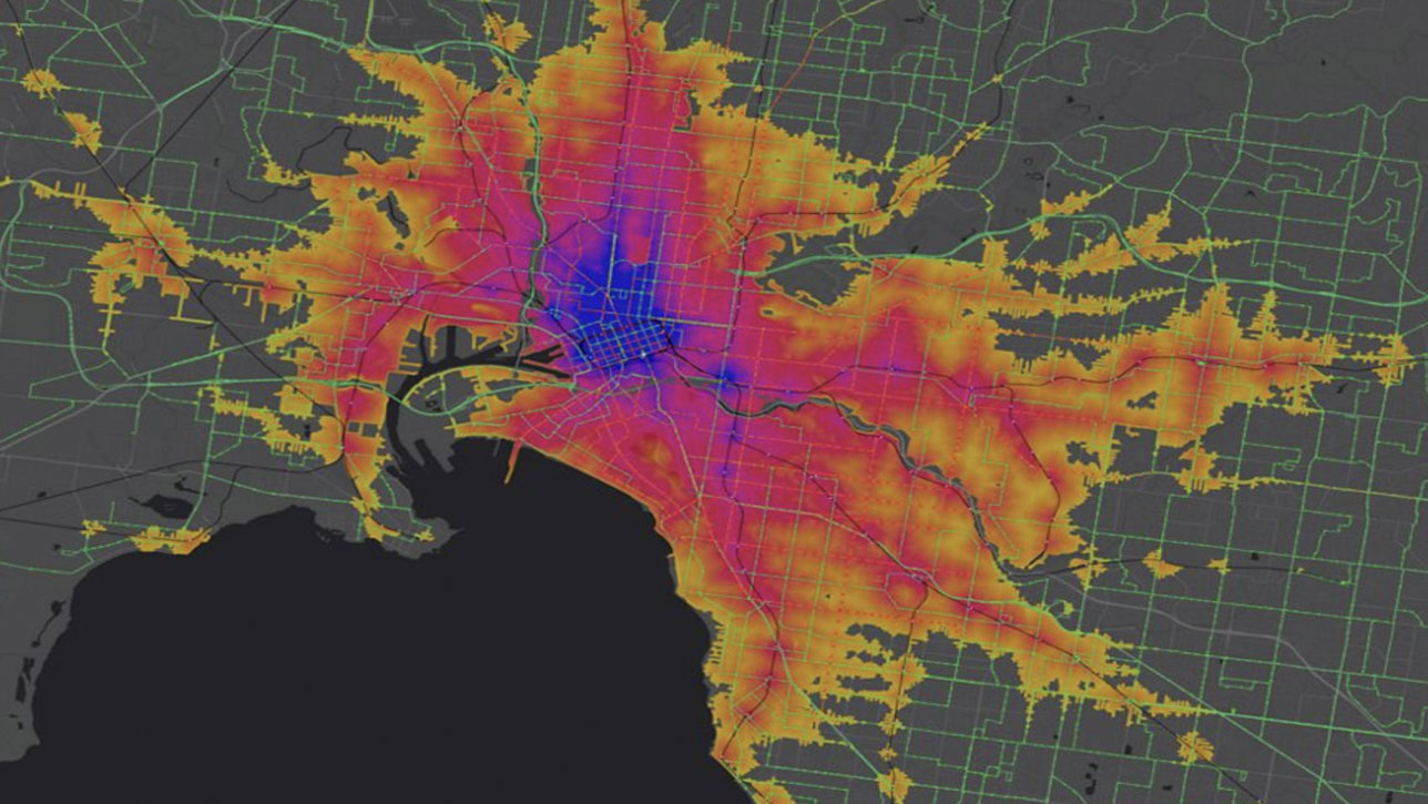 Karte, in der mit blau, violett, rot und orange schattierten Bereichen gezeigt wird, wie weit die Bevölkerung mit öffentlichen Verkehrsmitteln reisen kann 