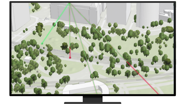 A computer displaying the surveillance perimeter and blind spots in front of a building